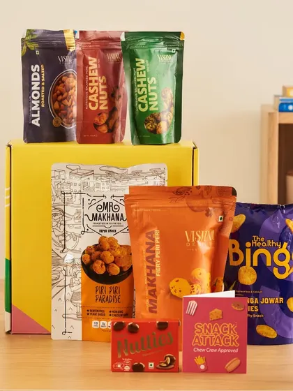 For the healthy snacker, this gift box is packed with a variety of nutritious treats like makhana, roasted nuts, and jowar puffs.