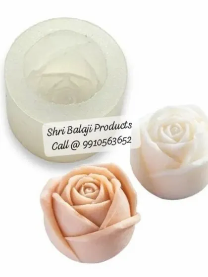 This image shows a small rosebud silicone mold and the resulting candles. These are great for making embeds, small gift soaps, or decorative wax melts.