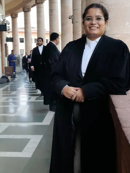 A smiling photo in the corridors of the Supreme Court.