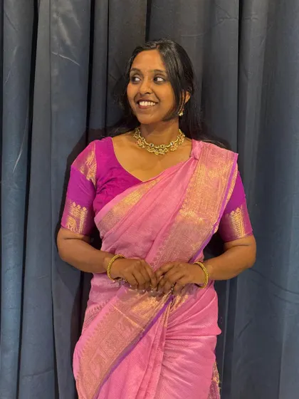"Ponnu ready, Mapla yenge?" (The bride is ready, where is the groom?). A playful moment in a beautiful pink silk saree, perfect for a bridal photoshoot or a fun pre-wedding reel.