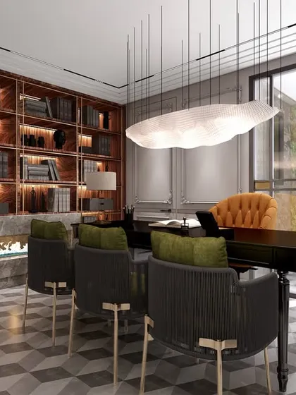 Another view of the lawyer's chamber, showcasing the impressive floor-to-ceiling library and the unique cloud-like pendant light. The space is designed to be both a functional workspace and an impressive meeting area.
