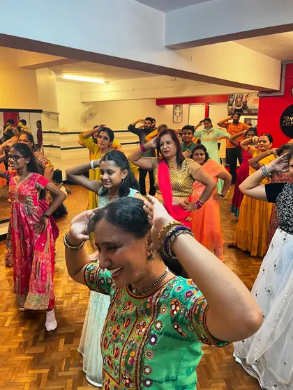 Our adult students learning the traditional moves of Garba. The joy and laughter during this session were infectious.