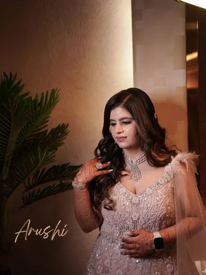 A beautiful portrait of the bride in her pastel gown, her name elegantly written on the photo. A perfect shot for her engagement album.
