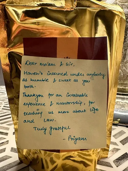 A sweet, handwritten note from Priyam. Small gestures like these remind us of the meaningful connections we build with our team beyond case files and deadlines.