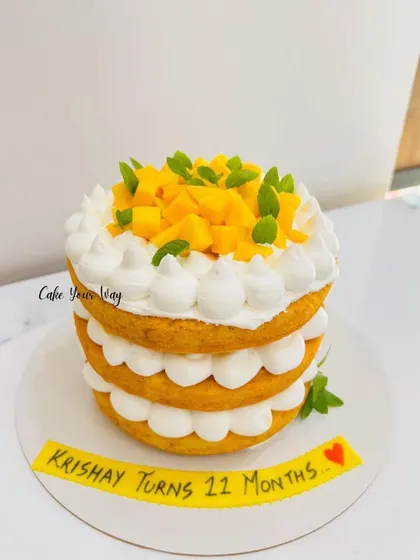 A naked mango cake celebrating 11 months of sweetness.