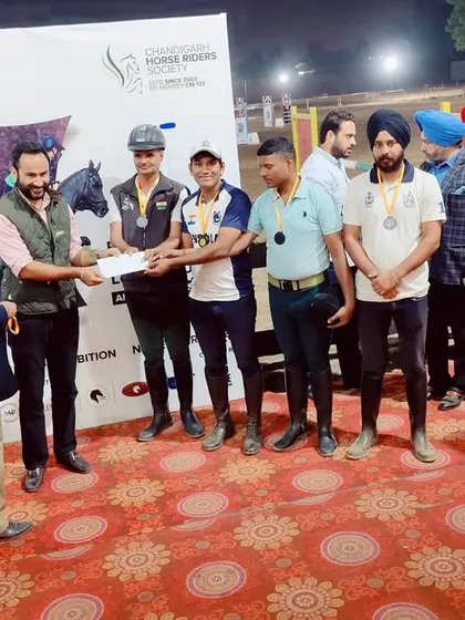 Our team receiving their prize after winning team bronze at the Chandigarh Horse Show. Teamwork is at the heart of our success.