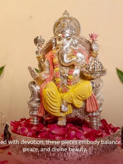 Bringing home blessings, wisdom, and prosperity with my divine touch. This majestic Ganesha idol, seated in a silver urli filled with rose petals, is a centerpiece of devotion for Ganesh Chaturthi.