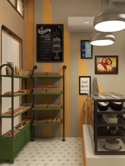 This retail and display area in the bakery uses simple, open shelving against a striped yellow and grey wall. The design is flexible and allows the products to be the main focus.