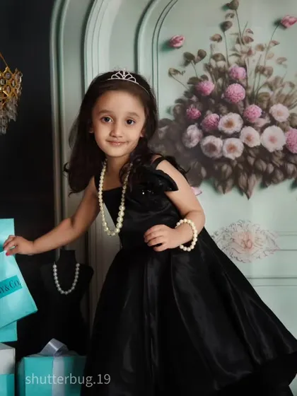 This stylish young girl is ready for a shopping spree in our chic and elegant fashion-themed setup.