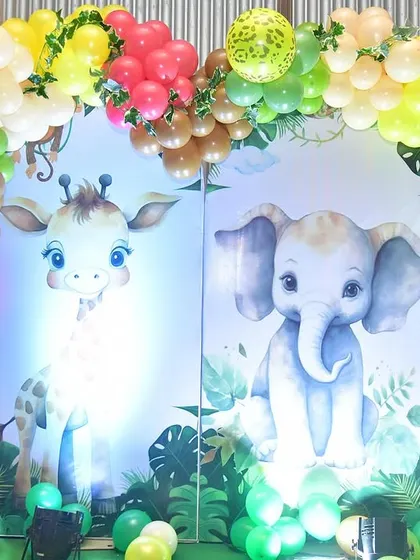 Another example of my custom backdrops, this one featuring a gentle giraffe and elephant for a softer take on the jungle theme.