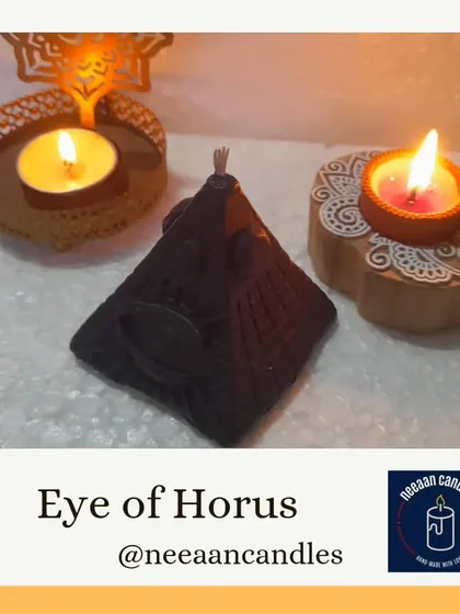Here is my Eye of Horus pyramid candle, lit alongside traditional diyas. It's a beautiful way to blend ancient symbols with the festive light of our culture.