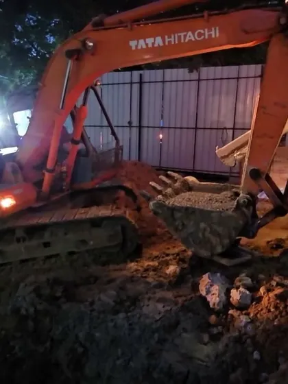 An identical shot of the excavator at work. This is the foundational stage of our design and build process, preparing the site for the structure to rise.