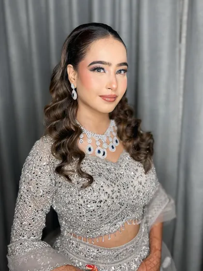 A full look at this stunning silver cocktail lehenga and the glamorous makeup we paired with it.