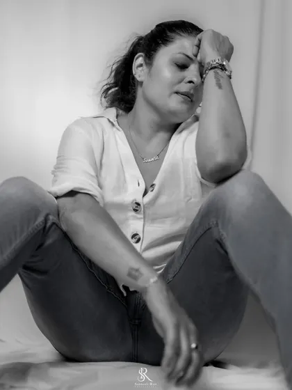 An emotional, candid-style monochrome portrait. Style is about expressing all facets of yourself, not just the happy ones.