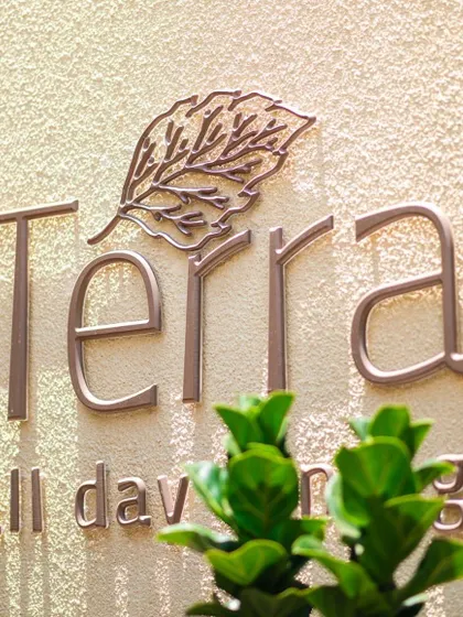 The elegant signage for our all-day dining restaurant, Terra, a name that reflects our connection to the earth and our farm-to-table philosophy.