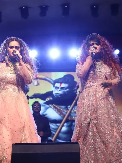 Performing with an image of Hanuman ji in the background on the final day of Navratri. We often include devotional segments in our shows to bring a spiritual element to the celebration.