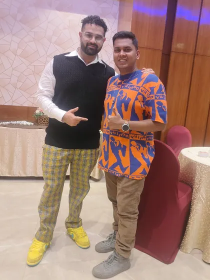 Pictured here with another guest at the Mahadevan family's private celebration.