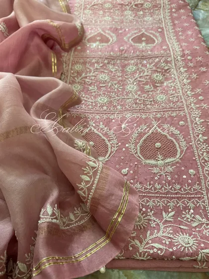 A close-up showing the drape of the ombré dupatta against the heavily worked kurta.