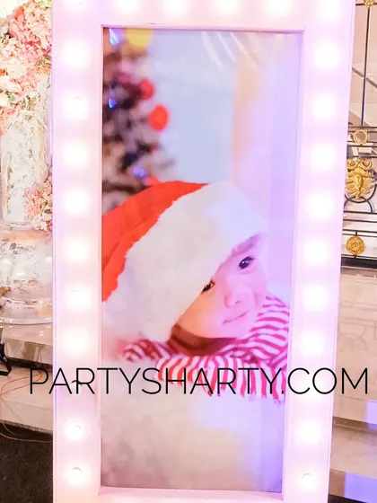 We use illuminated photo frames with themed pictures of the birthday child to add a personal touch to the decor.