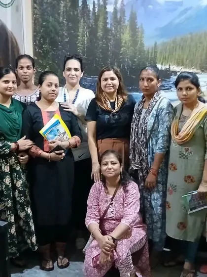 A group photo with the dedicated women and teachers at the center. Their hard work is the backbone of this community, and I am honored to support them.