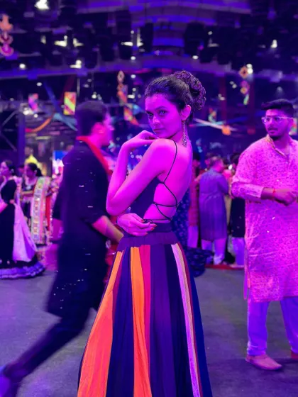 Posing during a Garba night. My choreography includes moments of flair and attitude, allowing dancers to express their personality.