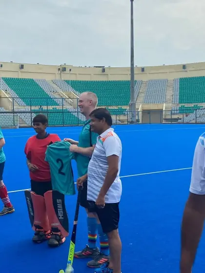 A moment of sportsmanship after the game, exchanging jerseys and sharing a laugh. These interactions are an important part of the hockey experience.