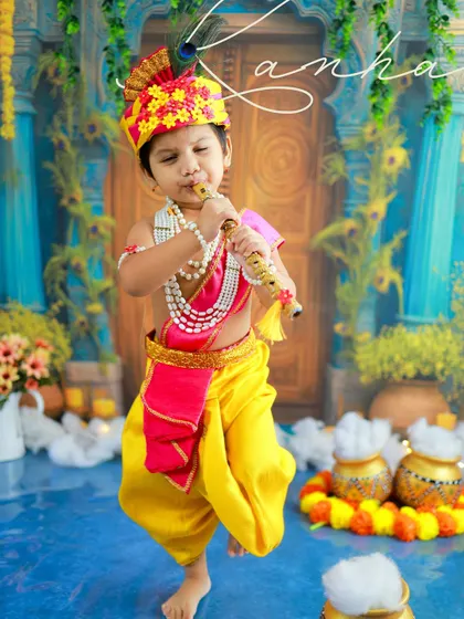 Our little Kanha playing his bansuri. This dynamic pose captures the playful energy of Lord Krishna, bringing the story to life in a single, powerful frame.