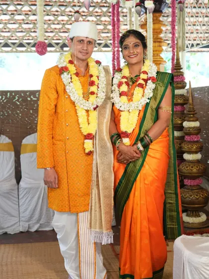 The wedding portrait of Aksharaa and Abhishek. A Kathak dancer from Hyderabad and an engineer from Texas, their paths united through our platform, rooted in spiritual values.