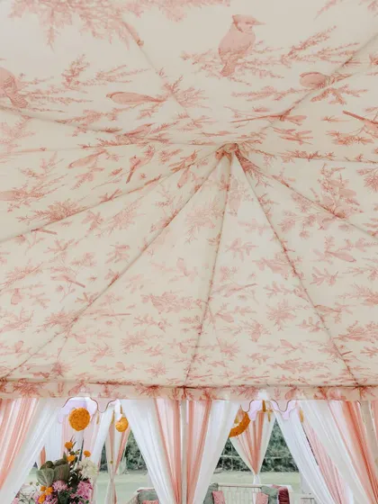 For this Chooda ceremony, we developed a custom elegant print for the tents to create a beautiful day brunch ambiance. The soft pink and white palette offered a warm and intimate setting for this special gathering.