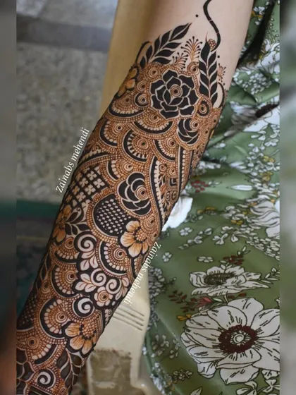 A beautiful bridal forearm design for Asba, featuring a mix of roses and other floral elements.