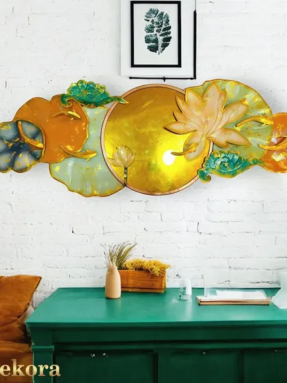 This elegant wall decor art piece combines color, texture, and a reflective surface to create a truly unique item.