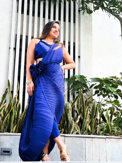 A powerful pose in a powerful drape. This is for women who are not afraid to be daring with their sarees.