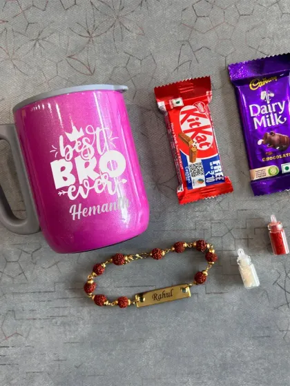 A simple and sweet Rakhi gift combo. It includes a personalized 'Best Bro Ever' mug, a name-engraved rakhi, and some chocolates.