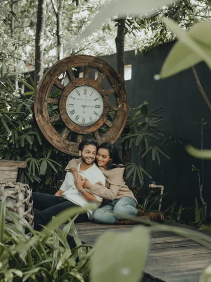 A tender moment shared between the couple, framed by the natural beauty of a garden. These are the simple, heartfelt images I love to create.