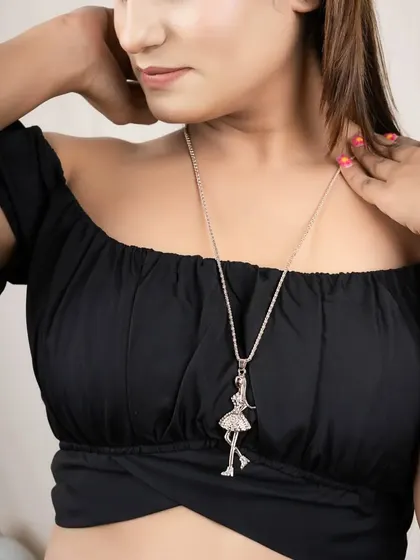 A close-up of a delicate pendant necklace. My photography highlights the fine details that make each piece of jewellery unique.