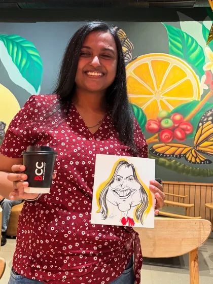 Her smile is as warm as the coffee. A great moment from my cafe collaboration.