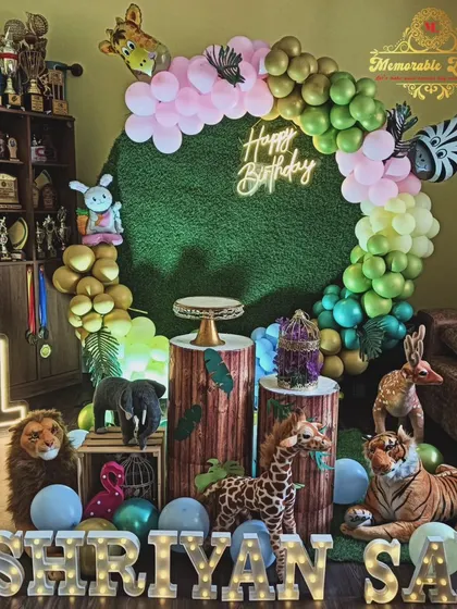 A close-up of the jungle-themed decoration, highlighting the neon sign and animal props.