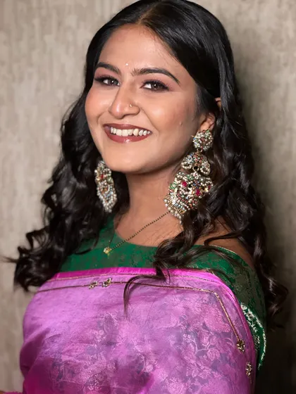 Supriya's smile lights up the room. This portrait captures the joy and confidence that comes with a makeup look you absolutely love.