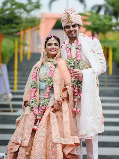 A classic portrait of the newlyweds, Disha and Prateek, right after their varmala ceremony. They look so elegant and happy together.