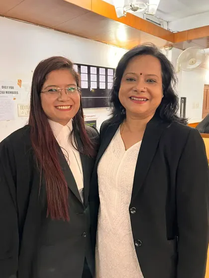 Sharing a happy moment with a senior advocate at the Supreme Court after a win. The legal fraternity is built on mutual respect and shared victories.