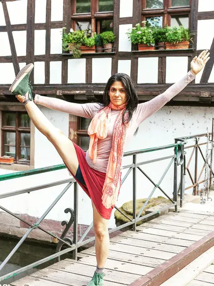 Utthita Hasta Padangusthasana on a bridge. Finding balance amidst the flow of life is what yoga teaches us. Every day is a perfect day for yoga.