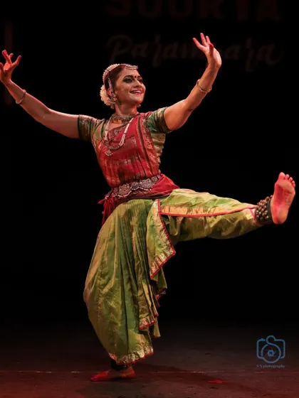 A powerful, wide-legged stance demonstrating the strength and grace of the form.