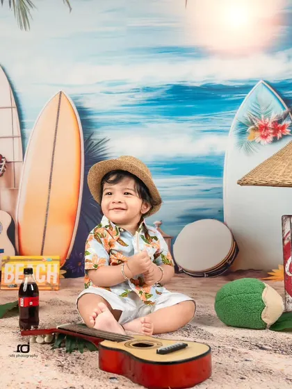 A happy smile from this little guy enjoying his studio beach day.