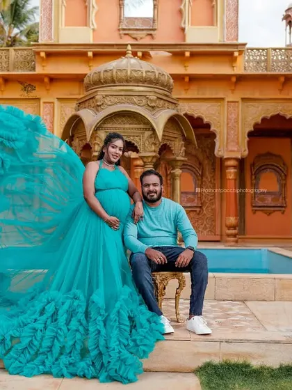 A royal setting for a maternity shoot. I styled the couple with a focus on her, using the dramatic teal gown to create a majestic and unforgettable portrait.