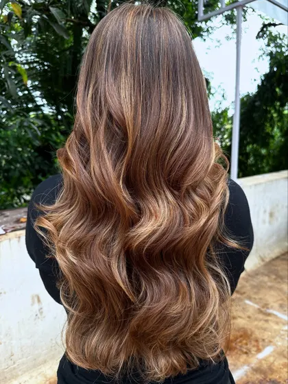 Another angle of this gorgeous blonde transformation, showing the seamless blend of highlights.