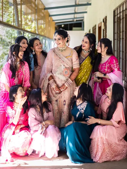 A fun and candid shot of the bride with her entire bride tribe.