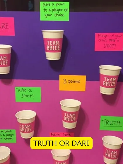 A DIY-style Truth or Dare game board for a bachelorette party. This is a great way to get the stories and the shots flowing.