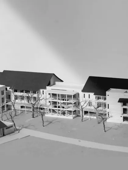 These black and white photos show the initial physical model for the JSW Sanjeevani Hospital. Model making is a crucial part of our design process, allowing us to study the building's form, scale, and relationship to the site in three dimensions.