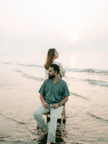 An artistic and moody shot using a chair in the ocean. I enjoy using simple props to create visually interesting and unconventional pre-wedding portraits.