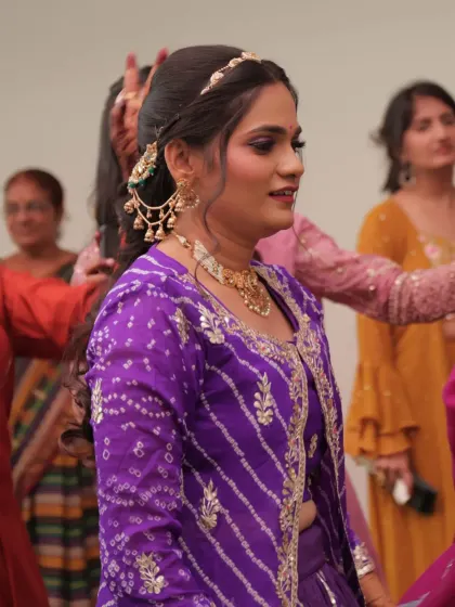 In the middle of the celebration. The makeup looks flawless even in action.